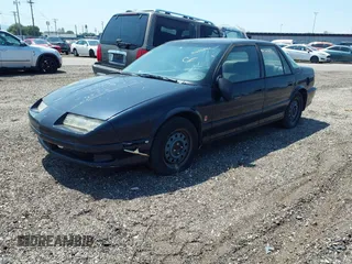 1994 Saturn SL z VIN 1G8ZJ557XRZ269410, wystawiony jako IAAI lot #31653894 z przebiegiem 132 202 mil mil oraz . Historia ofert i sprzedaży dostępna na DreamBid. Obrazek 2.