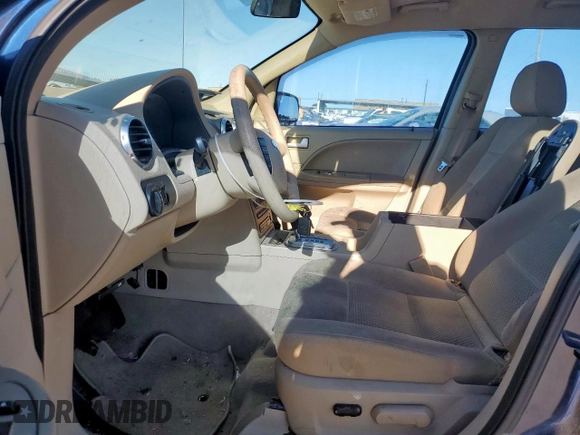 2005 Ford Freestyle SE z VIN 1FMZK01175GA28106, wystawiony jako Copart lot #56126035 z przebiegiem 121 936 mil mil oraz Szkoda całkowita • Salvage title. Historia ofert i sprzedaży dostępna na DreamBid. Obrazek 7.