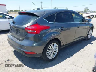 2018 Ford Focus Titanium with VIN 1FADP3N28JL232120, listed as a IAAI auction lot 42544070 with 28,661 mi miles and . Bid and sale history available at DreamBid. Image 4.