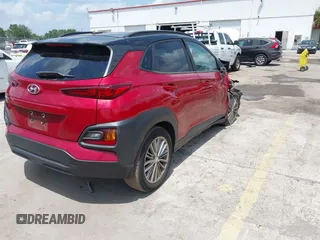 2020 Hyundai Kona SEL with VIN KM8K22AA2LU439411, listed as a IAAI auction lot 42309689 with 55,037 mi miles and . Bid and sale history available at DreamBid. Image 4.