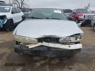 2003 Oldsmobile Alero GL1 z VIN 1G3NL52F43C169291, wystawiony jako IAAI lot #41546681 z przebiegiem 176 341 mil mil oraz . Historia ofert i sprzedaży dostępna na DreamBid. Obrazek 13.