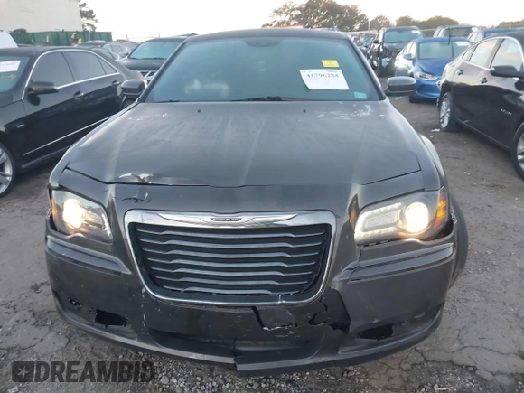 2014 Chrysler 300 S with VIN 2C3CCABG2EH352220, listed as a IAAI auction lot 41796284 with 127,070 mi miles and . Bid and sale history available at DreamBid. Image 6.