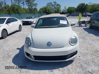 2013 Volkswagen Beetle 2.5L with VIN 3VW5P7AT3DM811617, listed as a IAAI auction lot 42055769 with 93,810 mi miles and . Bid and sale history available at DreamBid. Image 12.