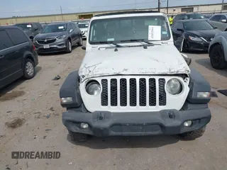 2020 Jeep Gladiator Sport S with VIN 1C6HJTAG9LL161535, listed as a IAAI auction lot 42053904 with 104,260 mi miles and . Bid and sale history available at DreamBid. Image 12.