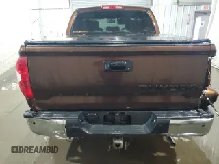 2014 Toyota Tundra Limited z VIN 5TFHY5F18EX411007, wystawiony jako Copart lot #43234915 z przebiegiem 172 193 mil mil oraz Szkoda całkowita • Salvage title. Historia ofert i sprzedaży dostępna na DreamBid. Obrazek 6.