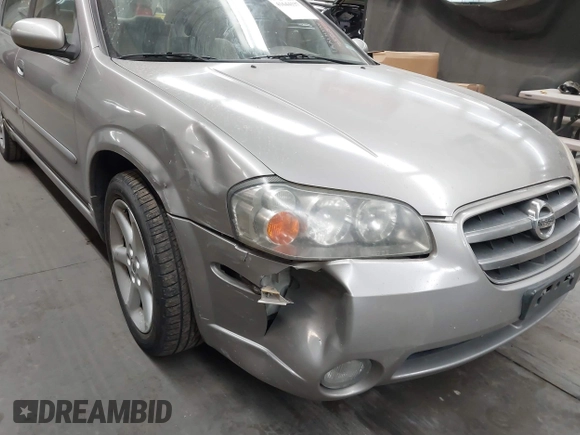 2002 Nissan Maxima GLE with VIN JN1DA31D32T422365, listed as a IAAI auction lot 41644137 with 165,157 mi miles and . Bid and sale history available at DreamBid. Image 6.