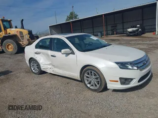 2012 Ford Fusion SEL z VIN 3FAHP0JAXCR412569, wystawiony jako IAAI lot #41420304 z przebiegiem 174 369 mil mil oraz . Historia ofert i sprzedaży dostępna na DreamBid. Obrazek 1.