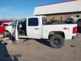 2010 Chevrolet Silverado 1500 LT with VIN 3GCRKSE31AG163396, listed as a IAAI auction lot 41022815 with Not Provided miles and . Bid and sale history available at DreamBid. Image 14.