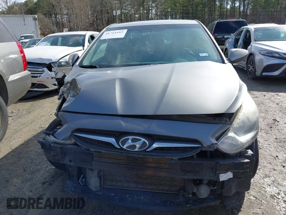 2014 Hyundai Accent GLS with VIN KMHCT4AEXEU710606, listed as a IAAI auction lot 41764163 with 103,859 mi miles. Bid and sale history available at carsss.com. Image 12.