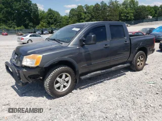 2011 Nissan Titan SL with VIN 1N6BA0ECXBN322611, listed as a Copart auction lot 63002925 with 159,785 mi miles and Salvage title. Bid and sale history available at DreamBid. Image 1.