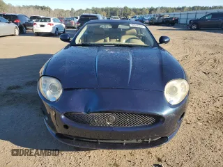 2007 Jaguar XK with VIN SAJDA44B075B06208, listed as a Copart auction lot 82694984 with 74,003 mi miles and Salvage Title. Bid and sale history available at carsss.com. Image 5.
