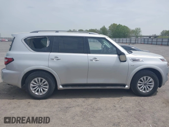 2021 Nissan Armada SV z VIN JN8AY2AD6M9661144, wystawiony jako IAAI lot #41854432 z przebiegiem 91 888 mil mil oraz . Historia ofert i sprzedaży dostępna na DreamBid. Obrazek 13.