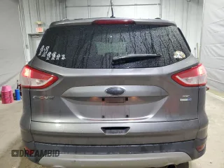 2013 Ford Escape SE z VIN 1FMCU9G98DUB42469, wystawiony jako Copart lot #55455265 z przebiegiem 151 975 mil mil oraz Szkoda całkowita • Salvage title. Historia ofert i sprzedaży dostępna na DreamBid. Obrazek 6.