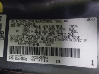 2014 Toyota Tundra 2WD Truck SR with VIN 5TFRY5F15EX166929, listed as a IAAI auction lot 41458810 with 142,152 mi miles. Bid and sale history available at carsss.com. Image 9.