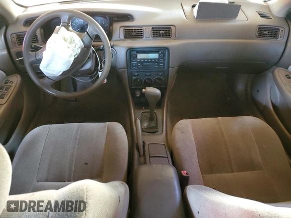 2001 Toyota Camry LE z VIN JT2BF22K510303027, wystawiony jako Copart lot #85090174 z przebiegiem 253 038 mil mil oraz Szkoda całkowita • Salvage title. Historia ofert i sprzedaży dostępna na DreamBid. Obrazek 8.