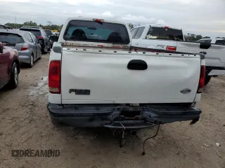 2000 Ford Super Duty F-250 XL with VIN 1FTNF20L8YEA71116, listed as a Copart auction lot 73739324 with 303,338 mi miles and Salvage Title. Bid and sale history available at carsss.com. Image 6.