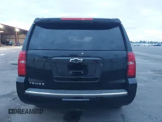 2015 Chevrolet Tahoe LTZ z VIN 1GNSKCKC5FR213209, wystawiony jako IAAI lot #41023368 z przebiegiem Nie podano mil oraz . Historia ofert i sprzedaży dostępna na DreamBid. Obrazek 15.
