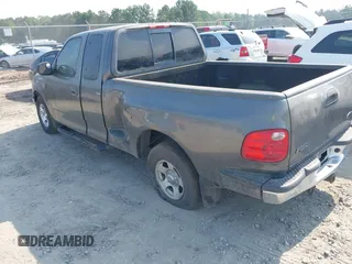 2003 Ford F-150 XL with VIN 2FTRX07W93CB11978, listed as a IAAI auction lot 42549547 with 209,486 mi miles and . Bid and sale history available at DreamBid. Image 3.