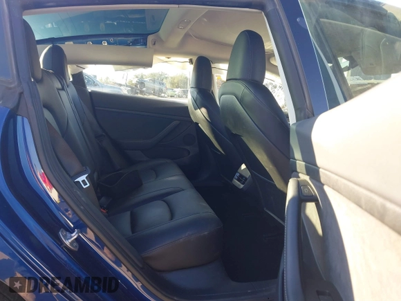 2023 Tesla Model 3 with VIN 5YJ3E1EA6PF505252, listed as a IAAI auction lot 41380172 with 31,141 mi miles and . Bid and sale history available at DreamBid. Image 8.