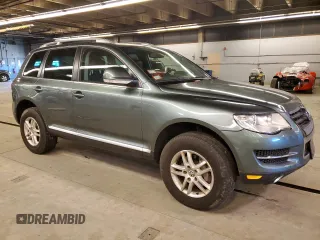 2008 Volkswagen Touareg V6 с VIN WVGBE77L48D026281, выставлен на аукционе Copart как лот 77111554 с пробегом 73 789 миль миль и Списание • Salvage title. История ставок и продаж доступна на DreamBid. Изображение 4.