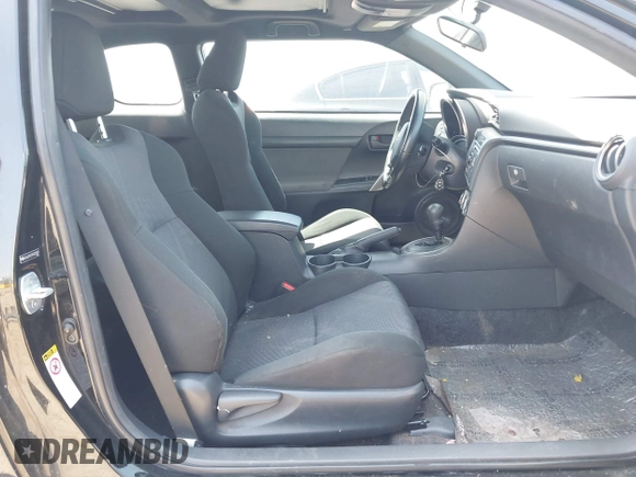 2012 Scion tC with VIN JTKJF5C79C3025581, listed as a IAAI auction lot 42170728 with 92,842 mi miles. Bid and sale history available at carsss.com. Image 5.
