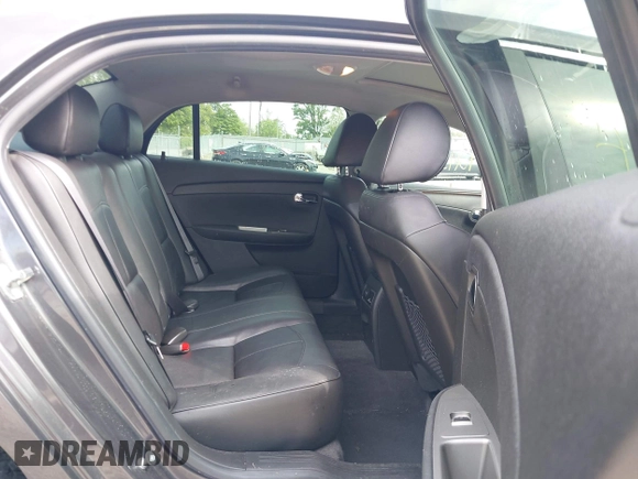 2012 Chevrolet Malibu LTZ with VIN 1G1ZG5E74CF297032, listed as a IAAI auction lot 42133482 with 82,682 mi miles and . Bid and sale history available at DreamBid. Image 8.