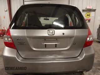 2007 Honda Fit with VIN JHMGD38417S045716, listed as a IAAI auction lot 42340897 with 63,765 mi miles and . Bid and sale history available at DreamBid. Image 6.