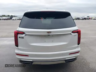 2021 Cadillac XT6 Premium Luxury z VIN 1GYKPCRS8MZ233209, wystawiony jako IAAI lot #40012714 z przebiegiem 45 599 mil mil oraz . Historia ofert i sprzedaży dostępna na DreamBid. Obrazek 16.