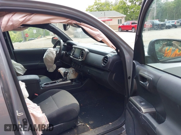 2020 Toyota Tacoma SR5 with VIN 3TMCZ5AN7LM341505, listed as a IAAI auction lot 42430647 with 73,285 mi miles and . Bid and sale history available at DreamBid. Image 5.