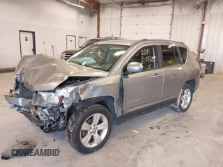 2016 Jeep Compass High Altitude Edition with VIN 1C4NJDEBXGD637792, listed as a IAAI auction lot 41850353 with 151,810 mi miles. Bid and sale history available at carsss.com. Image 2.