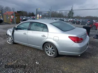 2010 Toyota Avalon XL with VIN 4T1BK3DB4AU357378, listed as a IAAI auction lot 38318161 with 74,523 mi miles and . Bid and sale history available at carsss.com. Image 3.