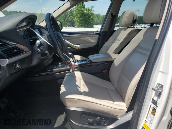 2012 BMW X5 35i z VIN 5UXZV4C54CL990840, wystawiony jako Copart lot #57715245 z przebiegiem 166 192 mil mil oraz Szkoda całkowita • Salvage title. Historia ofert i sprzedaży dostępna na DreamBid. Obrazek 7.