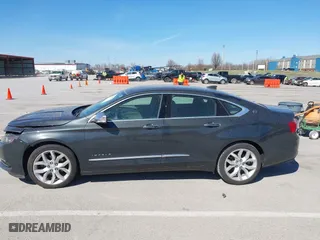 2015 Chevrolet Impala LTZ with VIN 2G1165S31F9136460, listed as a IAAI auction lot 41805917 with 136,254 mi miles. Bid and sale history available at carsss.com. Image 14.