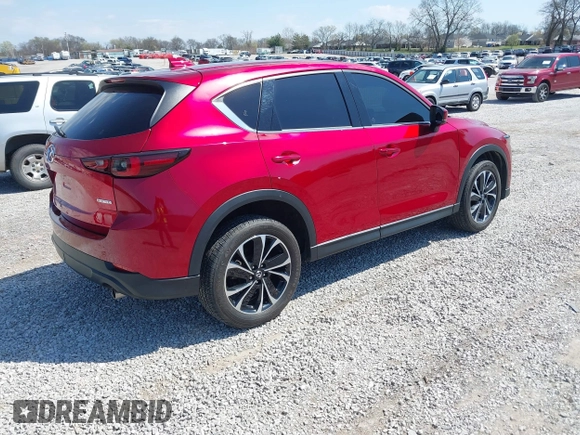 2022 Mazda CX-5 2.5 S Premium Package with VIN JM3KFBDM5N1532837, listed as a IAAI auction lot 41869721 with 59,249 mi miles. Bid and sale history available at carsss.com. Image 4.