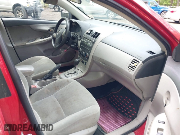 2011 Toyota Corolla L with VIN 2T1BU4EE3BC597999, listed as a IAAI auction lot 42192116 with 207,499 mi miles. Bid and sale history available at carsss.com. Image 5.