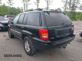 2000 Jeep Grand Cherokee Laredo with VIN 1J4G258S0YC182928, listed as a IAAI auction lot 42113376 with 259,882 mi miles and . Bid and sale history available at DreamBid. Image 3.