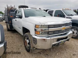 2015 Chevrolet Silverado 3500HD Work Truck z VIN 1GB4CYCG8FF574954, wystawiony jako Copart lot #58710575 z przebiegiem 203 905 mil mil oraz Czysty tytuł • Clean title. Historia ofert i sprzedaży dostępna na DreamBid. Obrazek 4.