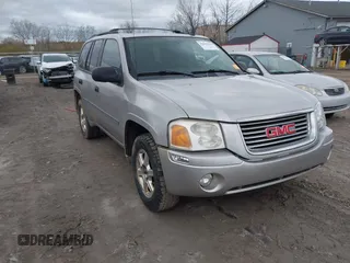 2008 GMC Envoy SLE2 with VIN 1GKDS13S982225326, listed as a IAAI auction lot 42046634 with 165,482 mi miles. Bid and sale history available at carsss.com. Image 1.