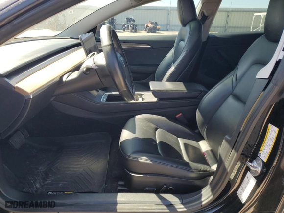 2021 Tesla Model 3 Standard Range Plus with VIN 5YJ3E1EA2MF986029, listed as a Copart auction lot 47848525 with 94,973 mi miles and Salvage Title. Bid and sale history available at carsss.com. Image 7.