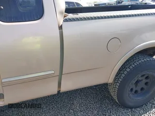 2001 Ford F-150 XL z VIN 1FTRX18WX1NA13022, wystawiony jako IAAI lot #41954491 z przebiegiem 126 284 mil mil oraz . Historia ofert i sprzedaży dostępna na DreamBid. Obrazek 6.