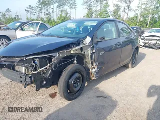 2015 Toyota Corolla L with VIN 5YFBURHE0FP283354, listed as a IAAI auction lot 41530183 with 165,228 mi miles and . Bid and sale history available at DreamBid. Image 6.