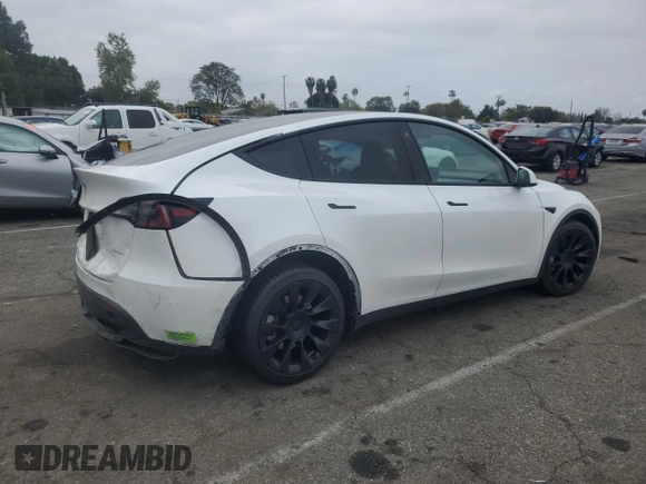 2023 Tesla Model Y Long Range with VIN 7SAYGDEE3PF583883, listed as a Copart auction lot 50920145 with 72,155 mi miles and Salvage Title. Bid and sale history available at DreamBid. Image 3.