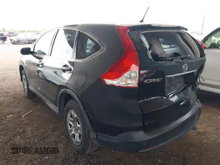 2013 Honda CR-V LX with VIN 2HKRM3H36DH511653, listed as a IAAI auction lot 39041262 with 90,336 mi miles and . Bid and sale history available at DreamBid. Image 3.