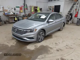 2021 Volkswagen Jetta SEL with VIN 3VWE57BUXMM056379, listed as a IAAI auction lot 42456450 with 34,697 mi miles and . Bid and sale history available at DreamBid. Image 17.