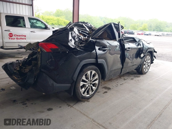 2021 Toyota RAV4 XLE Premium z VIN 2T3A1RFV0MW145999, wystawiony jako IAAI lot #42234472 z przebiegiem 57 424 mil mil oraz . Historia ofert i sprzedaży dostępna na DreamBid. Obrazek 4.