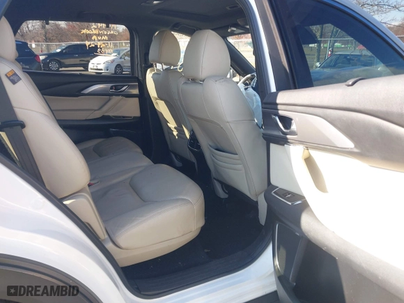 2018 Mazda CX-9 Grand Touring with VIN JM3TCBDY6J0200843, listed as a IAAI auction lot 40971233 with 94,770 mi miles. Bid and sale history available at carsss.com. Image 8.