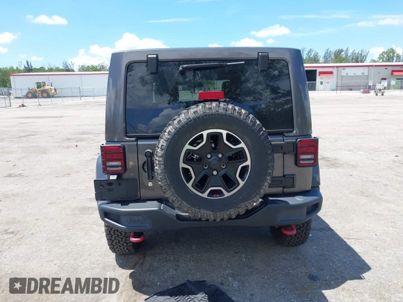 2017 Jeep Wrangler Unlimited Rubicon Recon with VIN 1C4HJWFG2HL560846, listed as a IAAI auction lot 42532745 with 101,285 mi miles and . Bid and sale history available at DreamBid. Image 16.