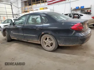 2003 Ford Taurus SEL Deluxe with VIN 1FAHP56S43A219925, listed as a Copart auction lot 76978824 with 191,000 mi miles and Salvage Title. Bid and sale history available at DreamBid. Image 2.