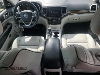 2019 Jeep Grand Cherokee Summit with VIN 1C4RJFJT3KC762191, listed as a Copart auction lot 60040685 with 98,200 mi miles and Salvage title. Bid and sale history available at DreamBid. Image 8.
