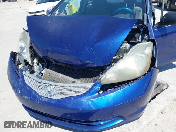 2009 Honda Fit with VIN JHMGE88249S056575, listed as a IAAI auction lot 41702555 with 116,658 mi miles. Bid and sale history available at carsss.com. Image 6.